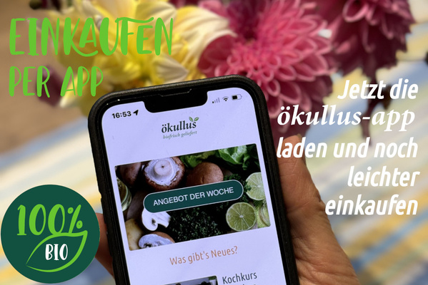 KI generiert: Ein Smartphone zeigt die ökullus-App. Text: "Einkaufen per App", "Jetzt die ökullus-app laden...", "100% BIO".